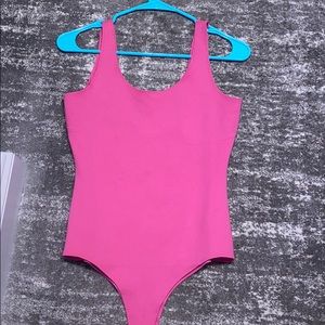 Pink body suit